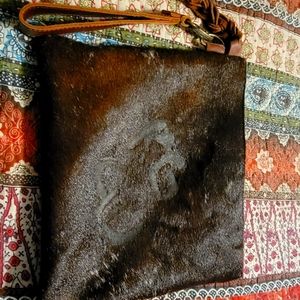 Cowhide/leather clutch bag